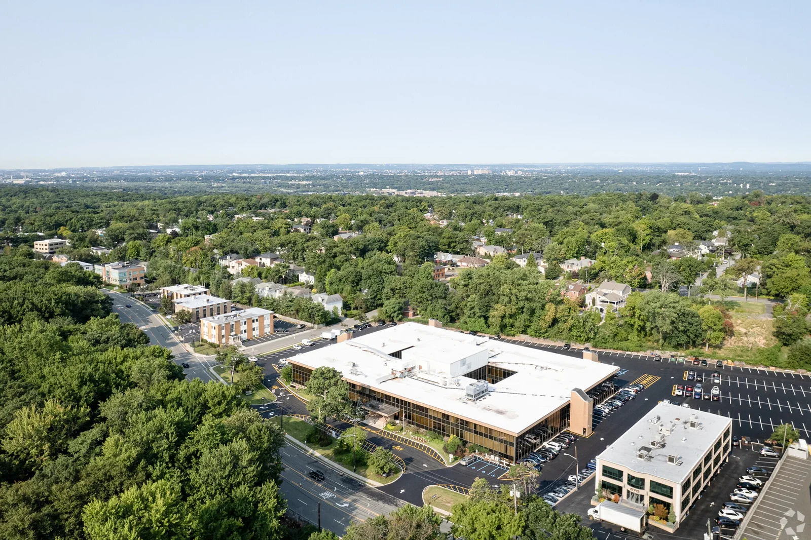 Aerial view of the US Executive Center building and surrounding Englewood Cliffs business corridor